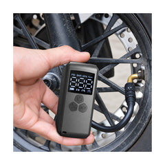 TANKE mini electric bike pump in its compact plastic housing