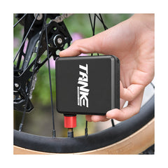 TANKE mini electric bike pump in its compact plastic housing